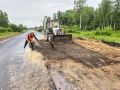 В Шарыповском округе продолжается ремонт дорог к деревням Можары и Росинка